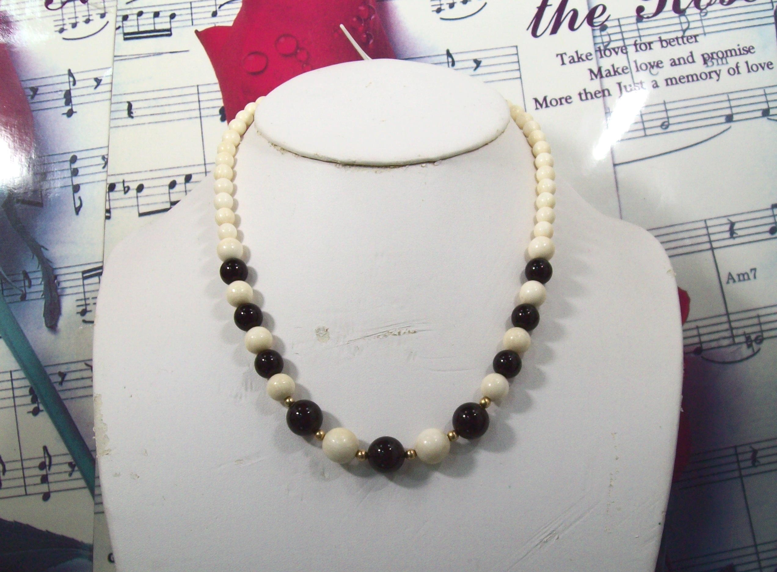 Vintage ivory and black onyx necklace graduated beads 16 inch IV163
