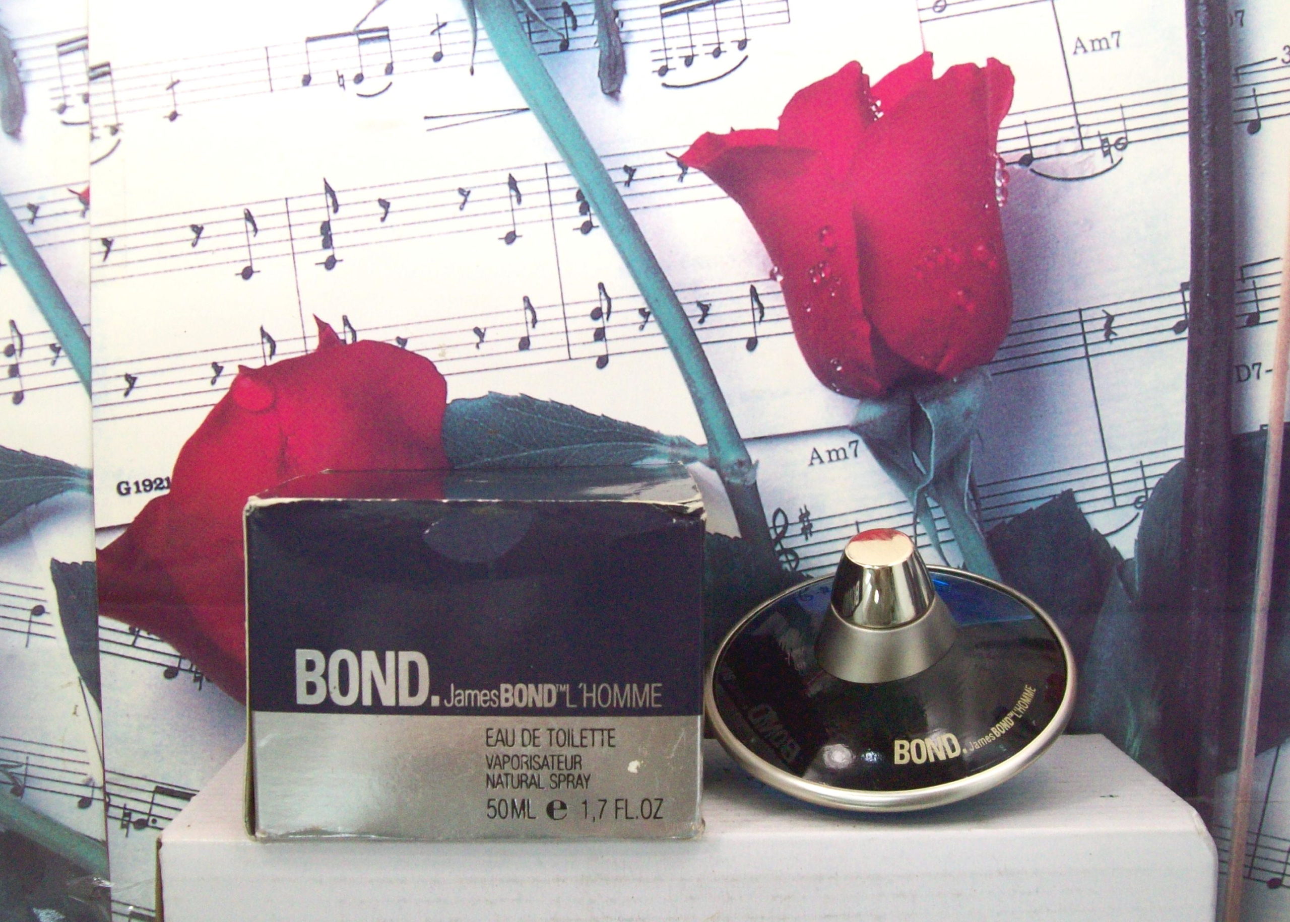 James Bond fragrance, L'Homme EDT, vintage cologne, men’s perfume spray, classic masculine scent, 1.7 oz fragrance, woody citrus cologne