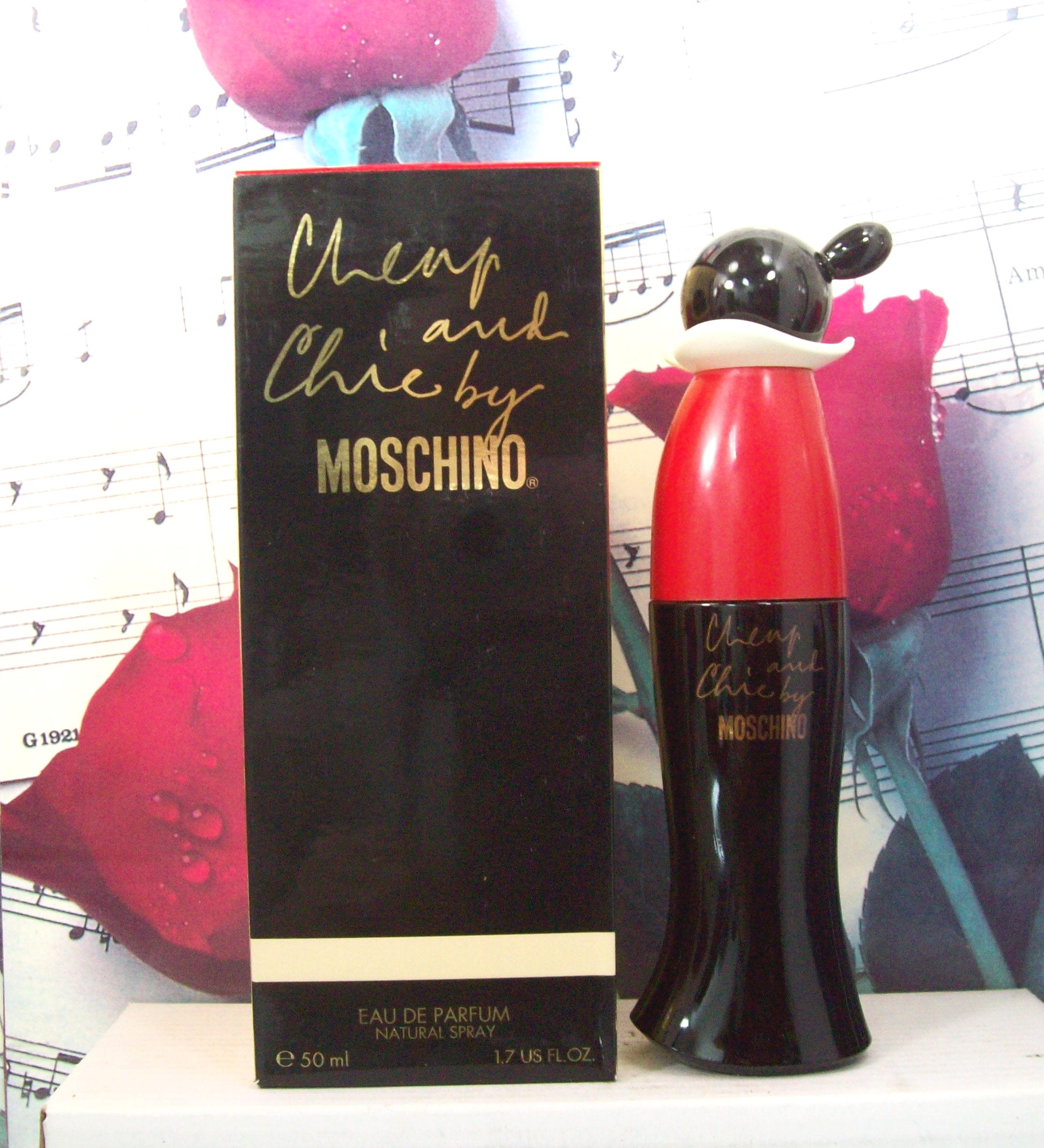 Moschino Cheap And Chic 1.7 OZ EDP Spray bottle front view