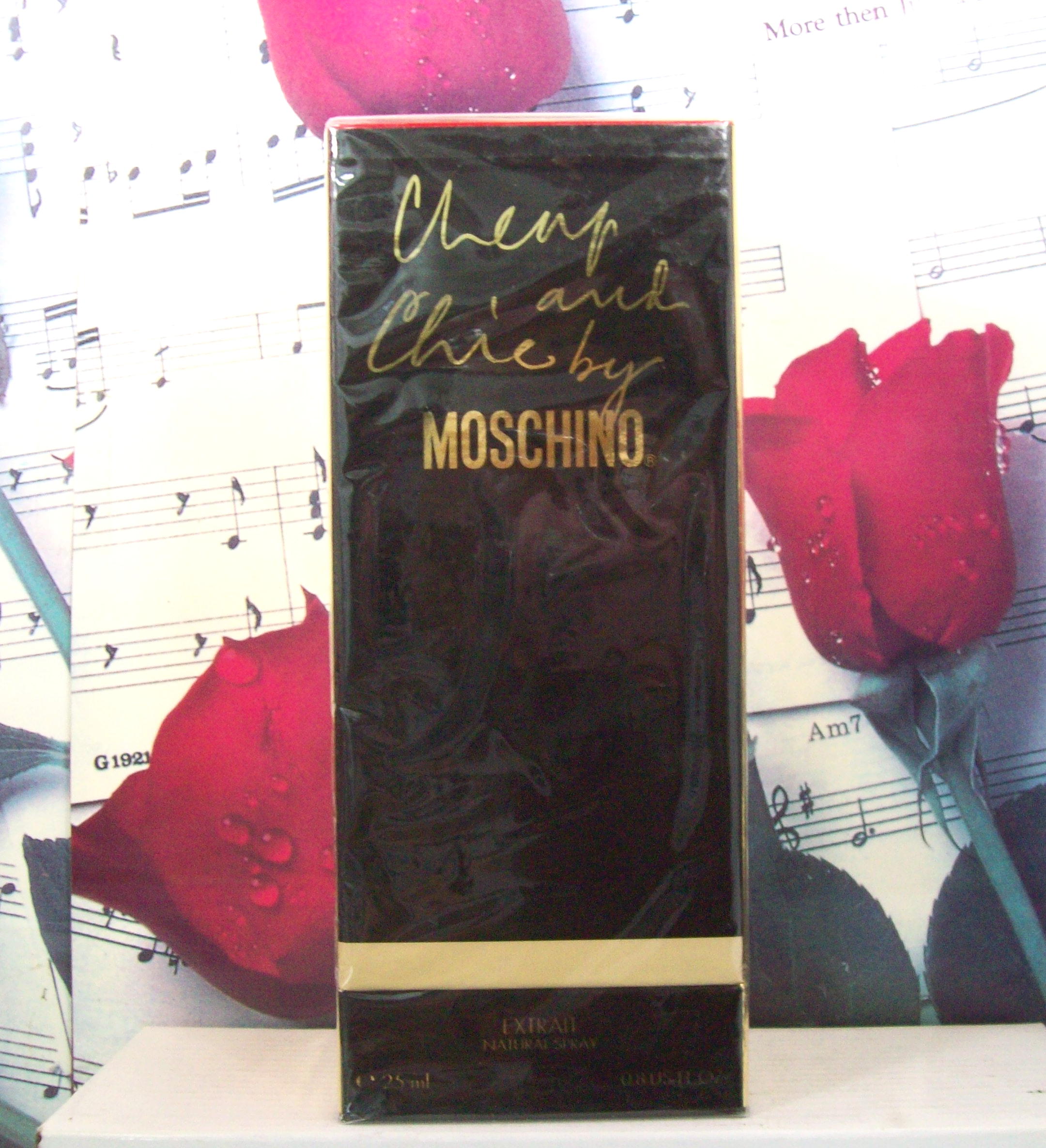 Moschino Cheap And Chic 0.8 OZ Extrait Spray perfume bottle front view