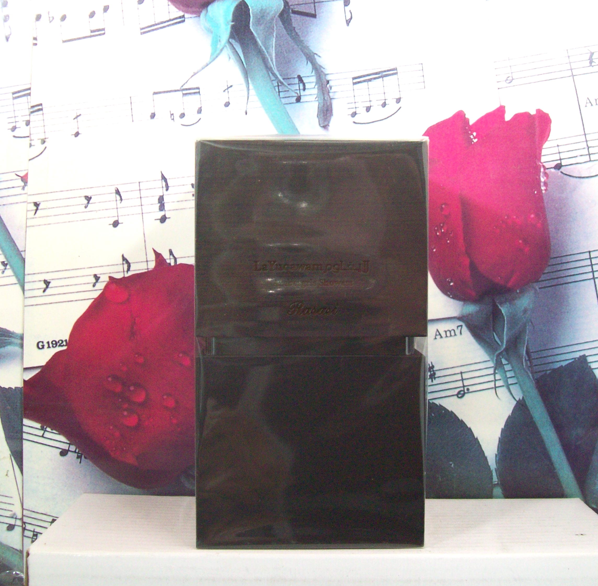 La Yuqawam Ambergris Showers EDP Spray 2.5 OZ bottle front view