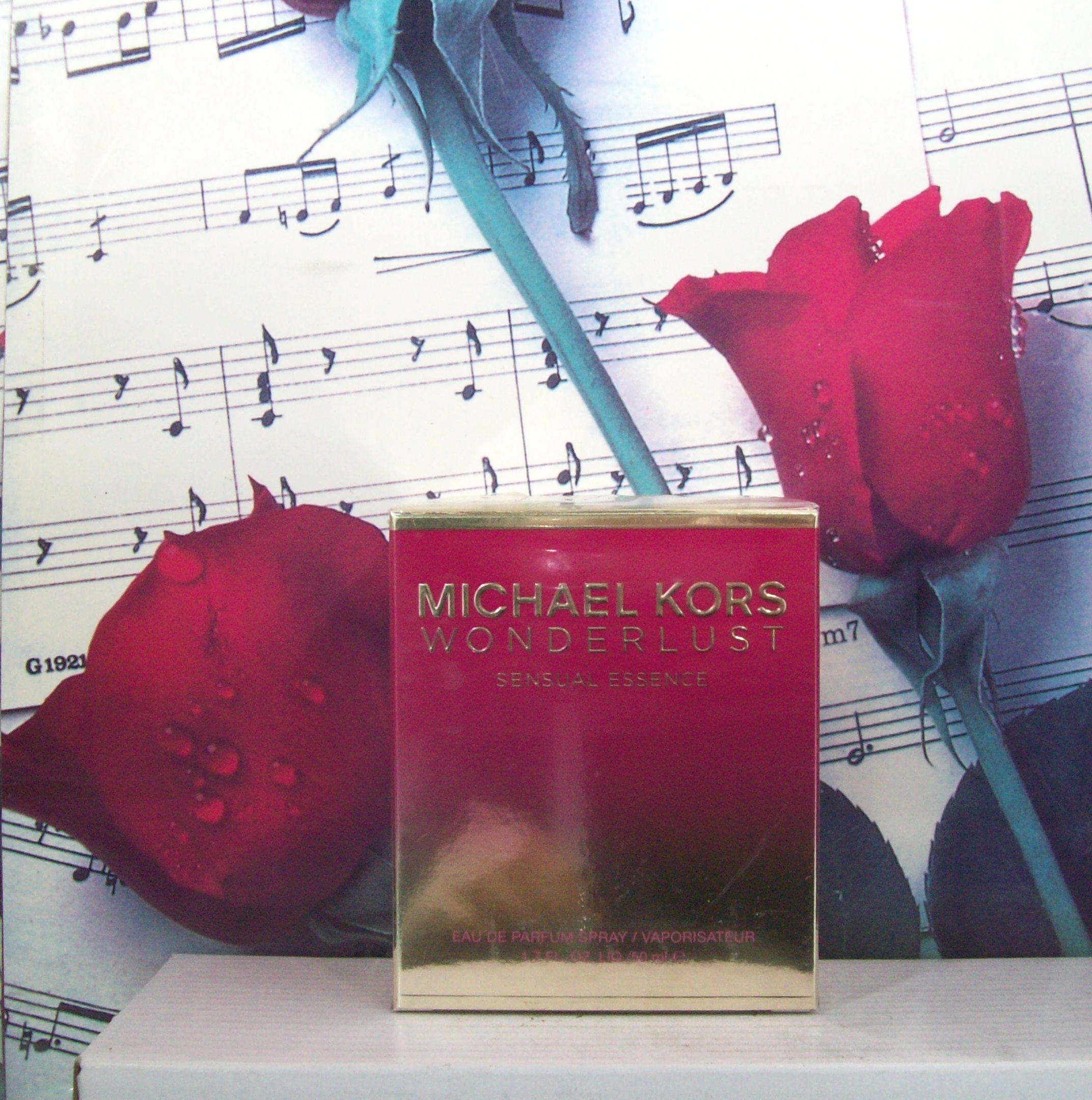 Michael Kors Wonderlust Sensual Essence 1.7 OZ EDP Spray bottle front view