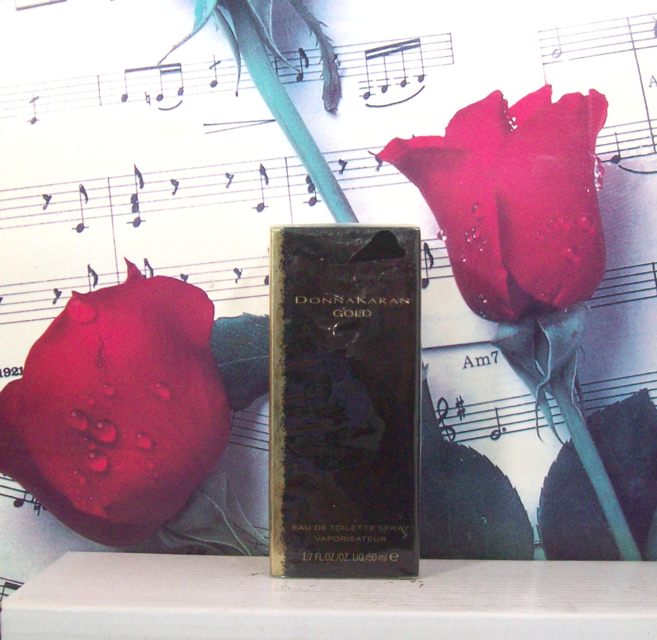 Donna Karan Gold 1.7 OZ EDT Spray perfume bottle