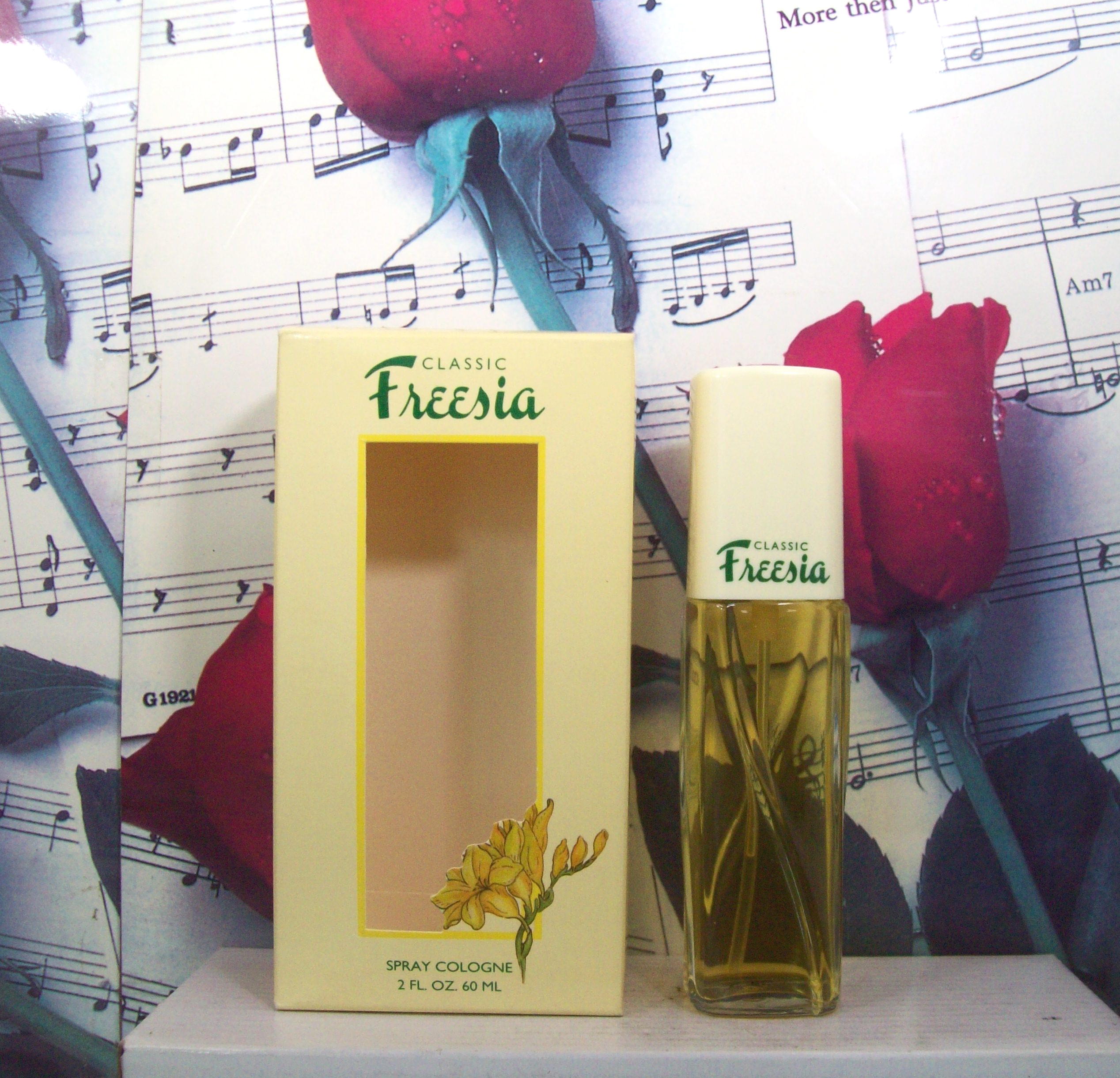 Classic Freesia By Dana 2.0 OZ Spray Cologne bottle front view
