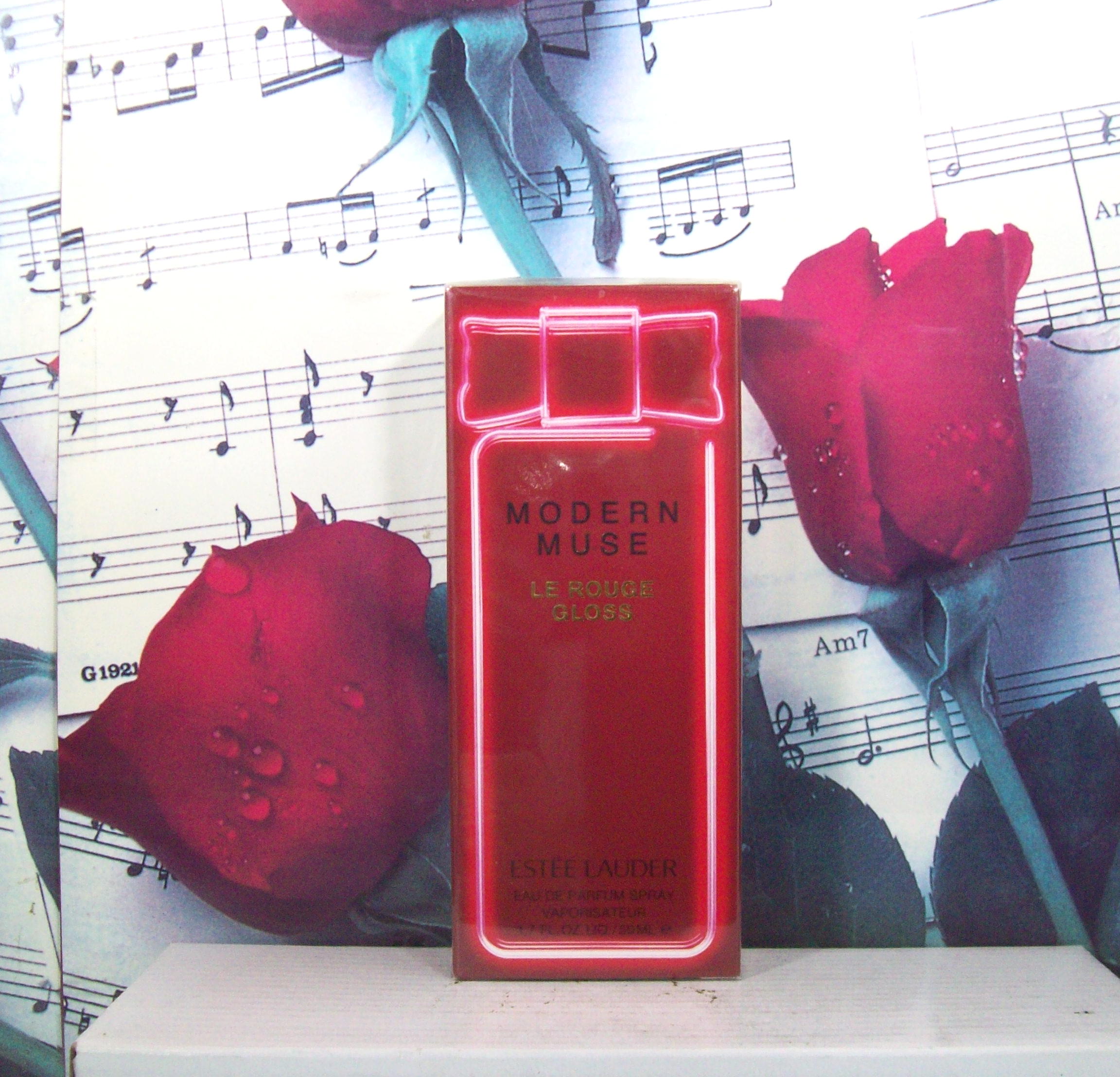 Modern Muse Le Rouge Gloss 1.7 OZ. EDP Spray bottle